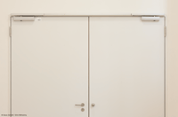 Hold-open systems for fire doors